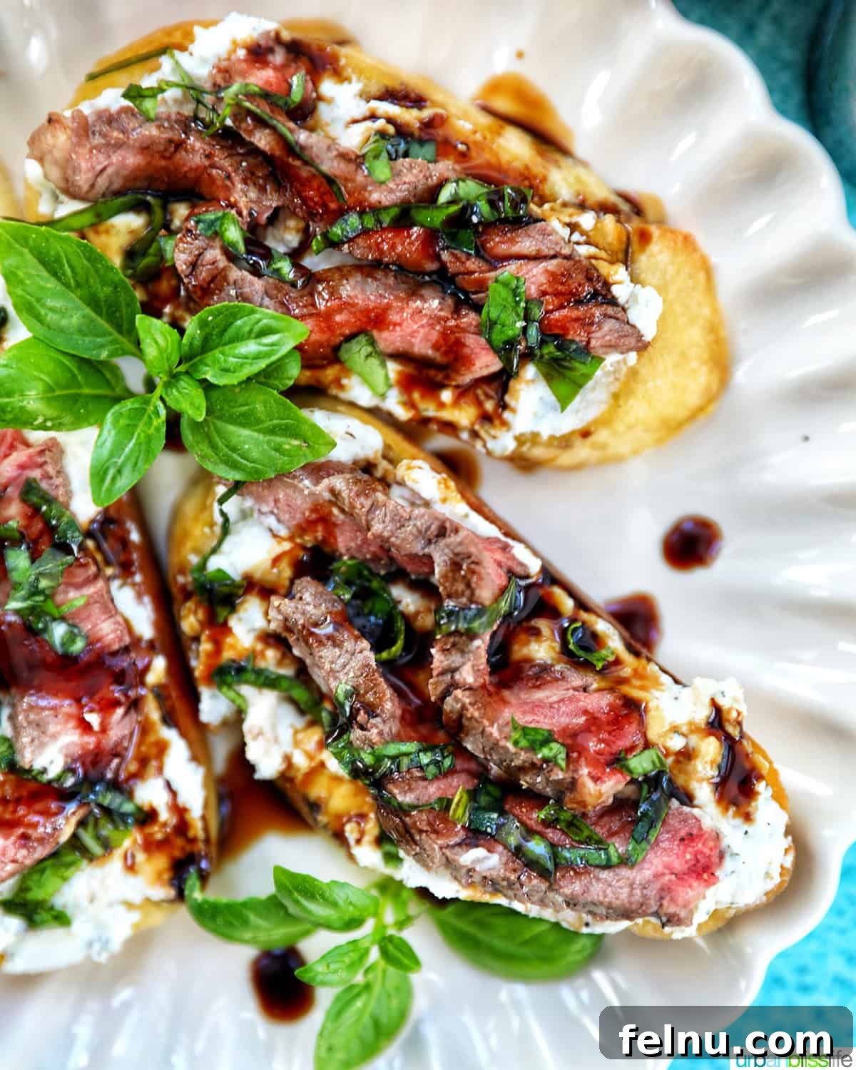 Steak Bites on Toasted Bread 2 Steak Crostini overhead view