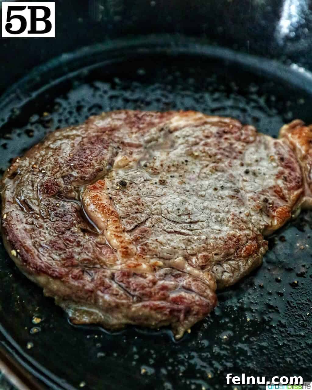 Steak Bites on Toasted Bread 11 Steak in a cast iron skillet