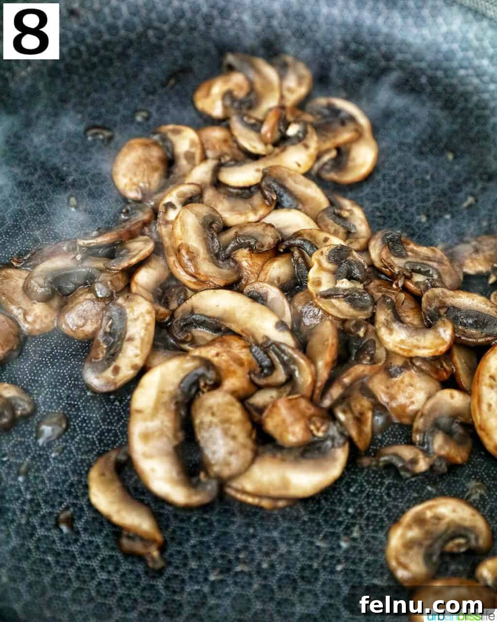 Savory Mushroom Toasts 12 Sautéing sliced mushrooms in a cast iron skillet until they are tender and slightly browned.