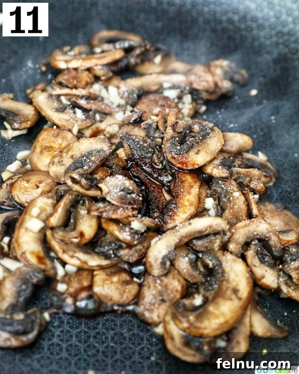 Savory Mushroom Toasts 15 All cooked mushrooms, seasoned and ready, in a cast iron skillet.
