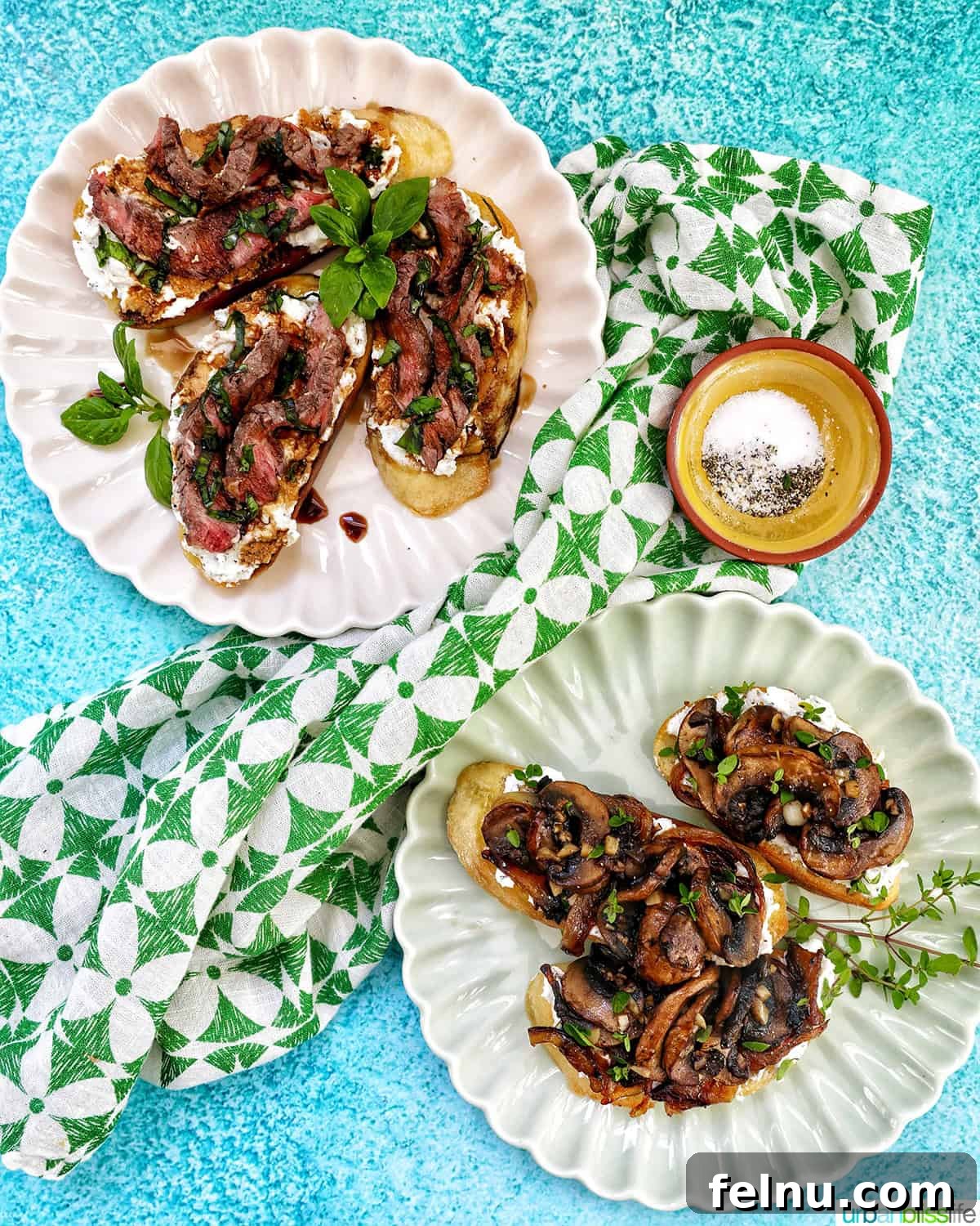 Savory Mushroom Toasts 20 Two plates laden with delicious mushroom crostini, viewed from overhead, ready for guests.