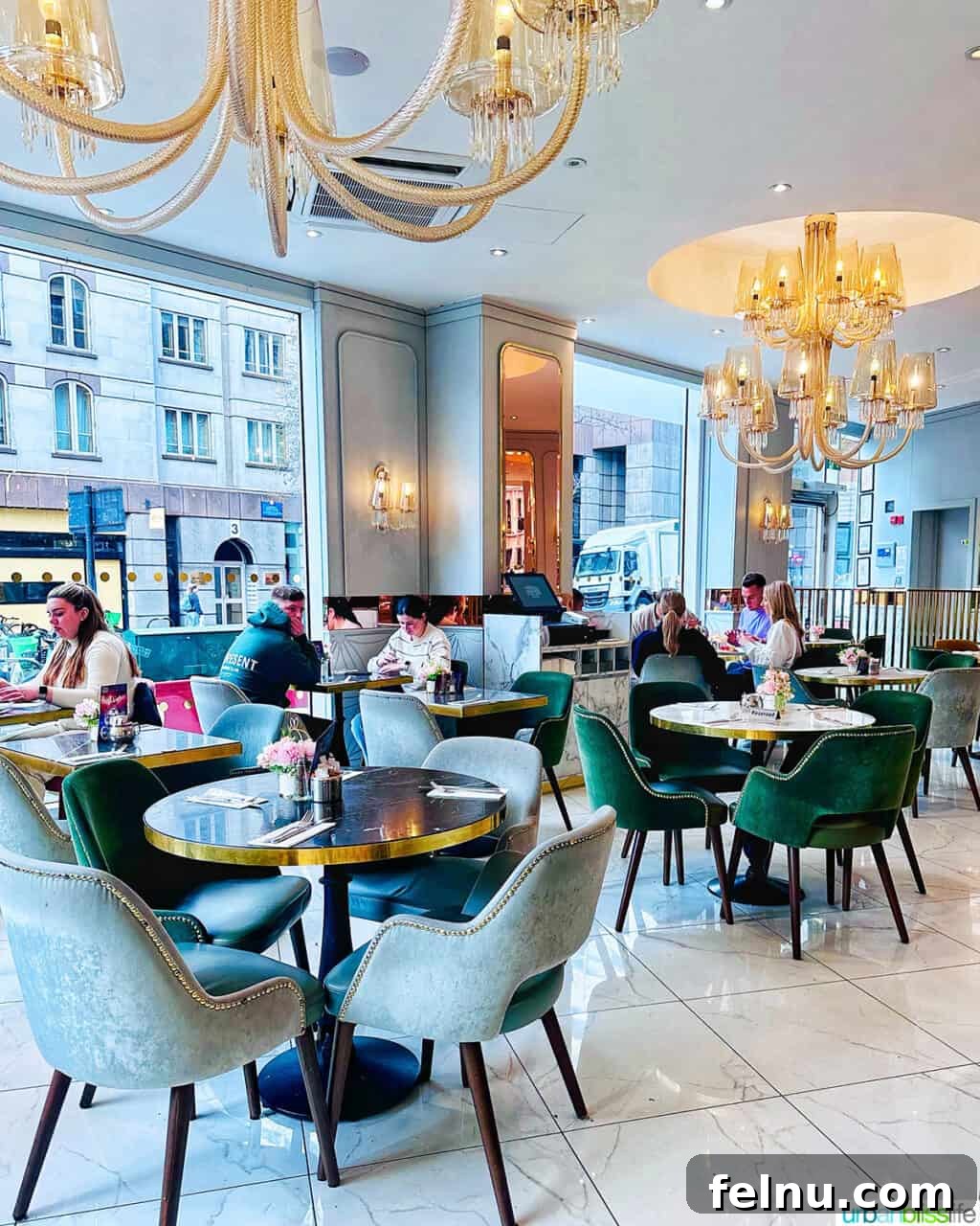London's Culinary Gems 13 The elegant interior of Caffe Concerto in London, featuring beautifully set tables and sophisticated decor.