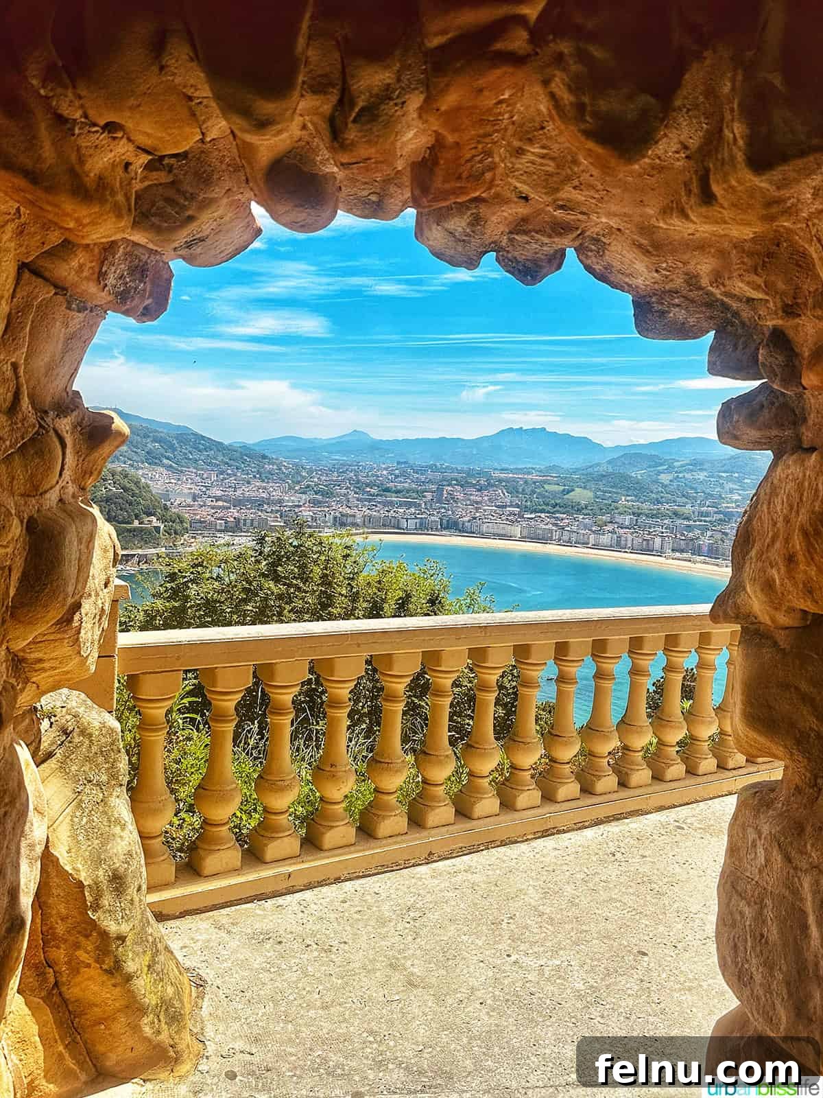 Top Experiences in San Sebastian 2 Panoramic view of San Sebastian, Spain, from a stone archway