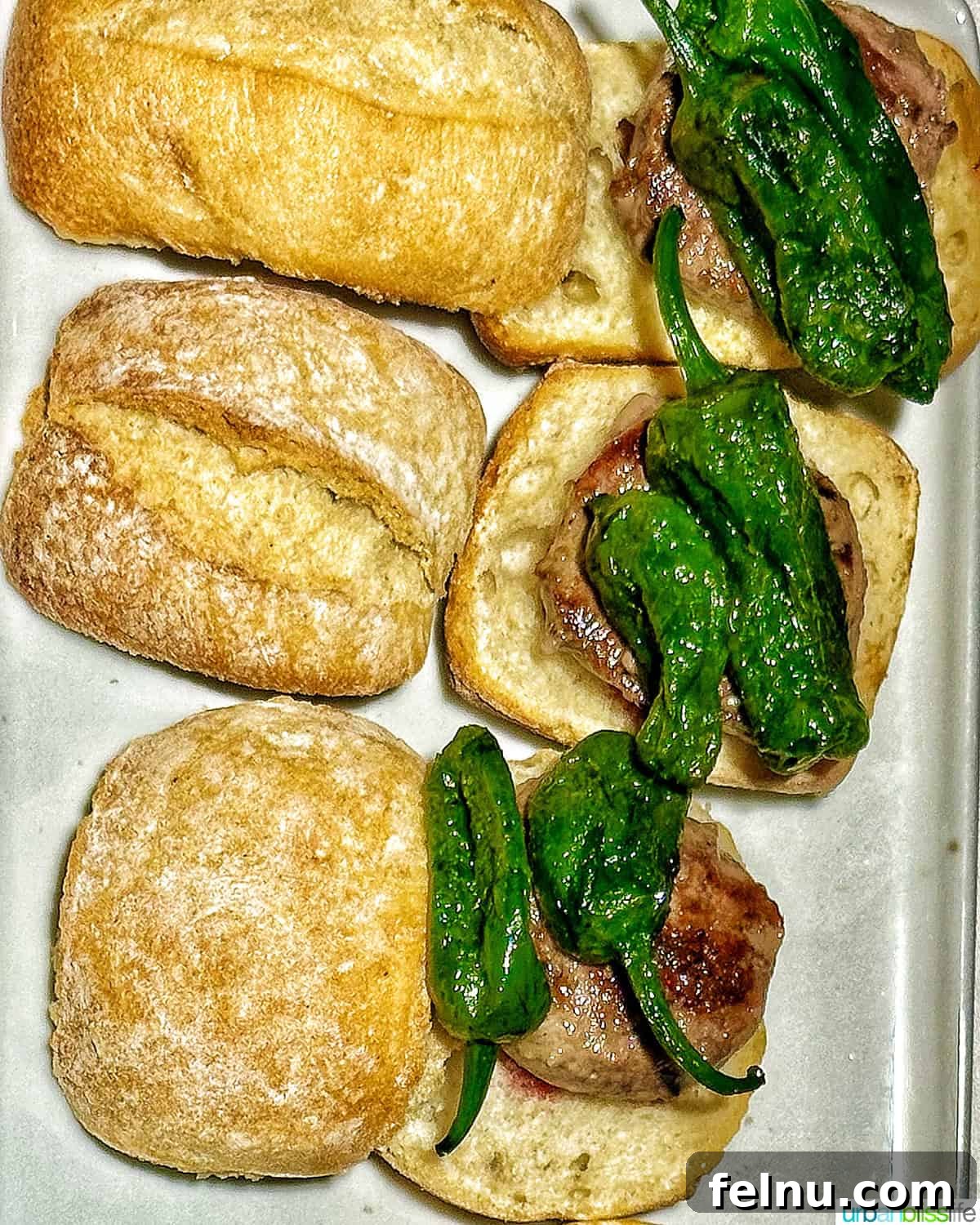 The Ultimate Pintxo Crawl: Bilbao's Best Bites 4 A close-up of a pintxo featuring tender beef and flavorful peppers nestled in crusty bread.
