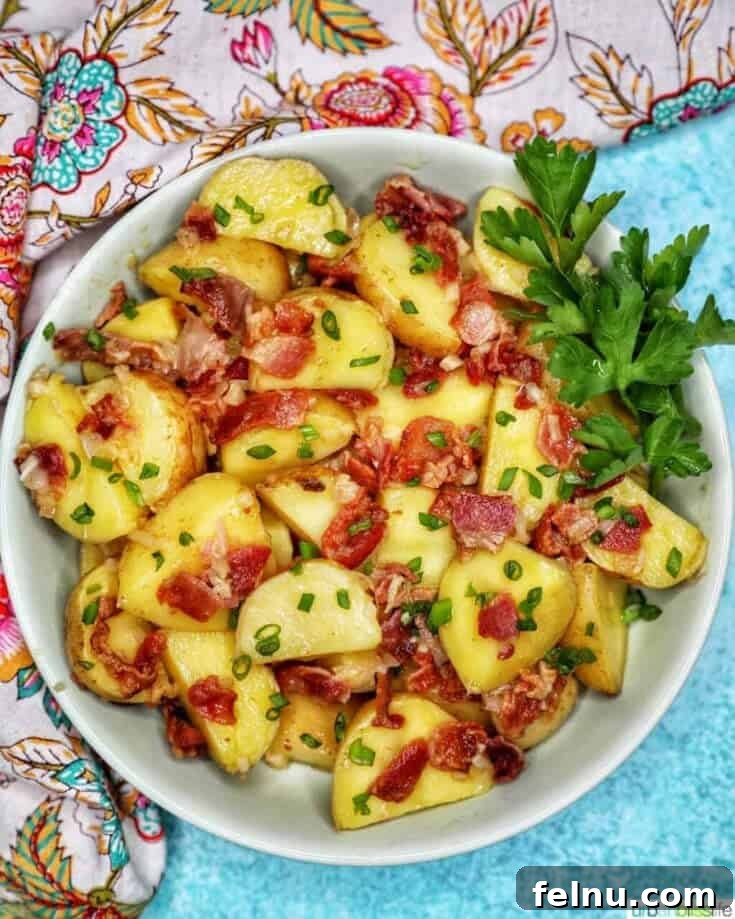 Tangy baby potato salad with crispy bacon bits