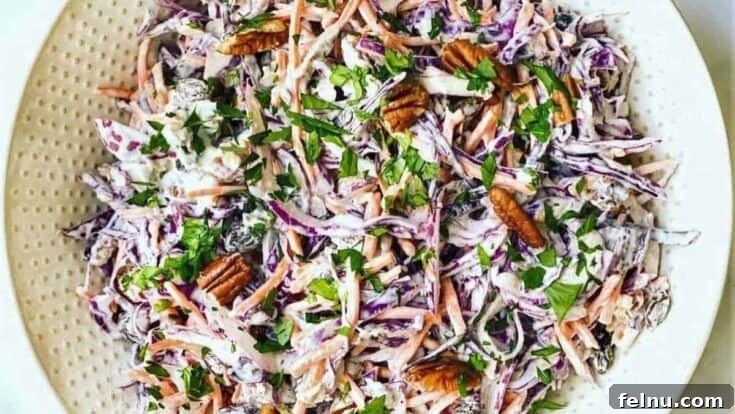 Winter coleslaw with seasonal vegetables, nuts, and raisins
