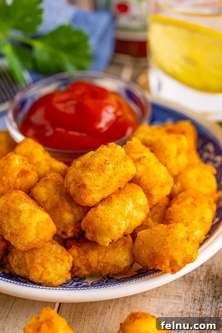 Crispy air fryer tater tots, golden brown and perfectly cooked