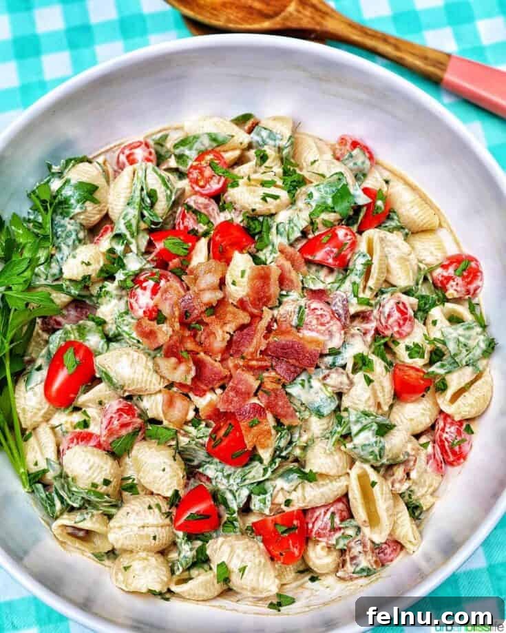 Creamy BLT pasta salad with crispy bacon, lettuce, and tomatoes