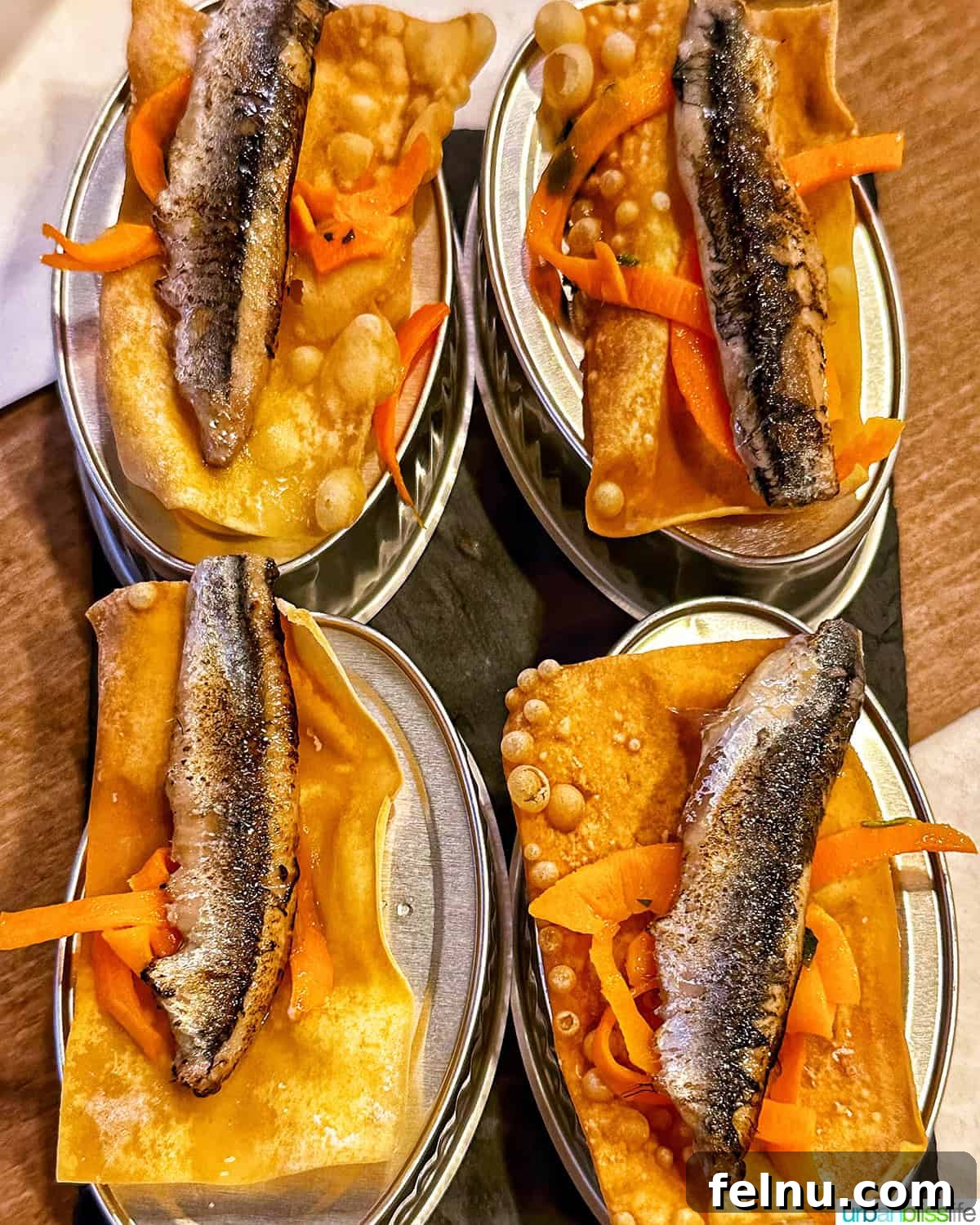 Bilbao Unveiled: Exploring Spain's Basque Masterpiece 21 A beautifully presented pintxos with sardines, a culinary highlight at Los Fueros restaurant.