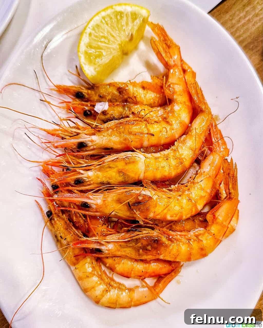 Bilbao Unveiled: Exploring Spain's Basque Masterpiece 22 Delicious prawn pintxos, showcasing fresh seafood and expert preparation, served at Los Fueros restaurant.