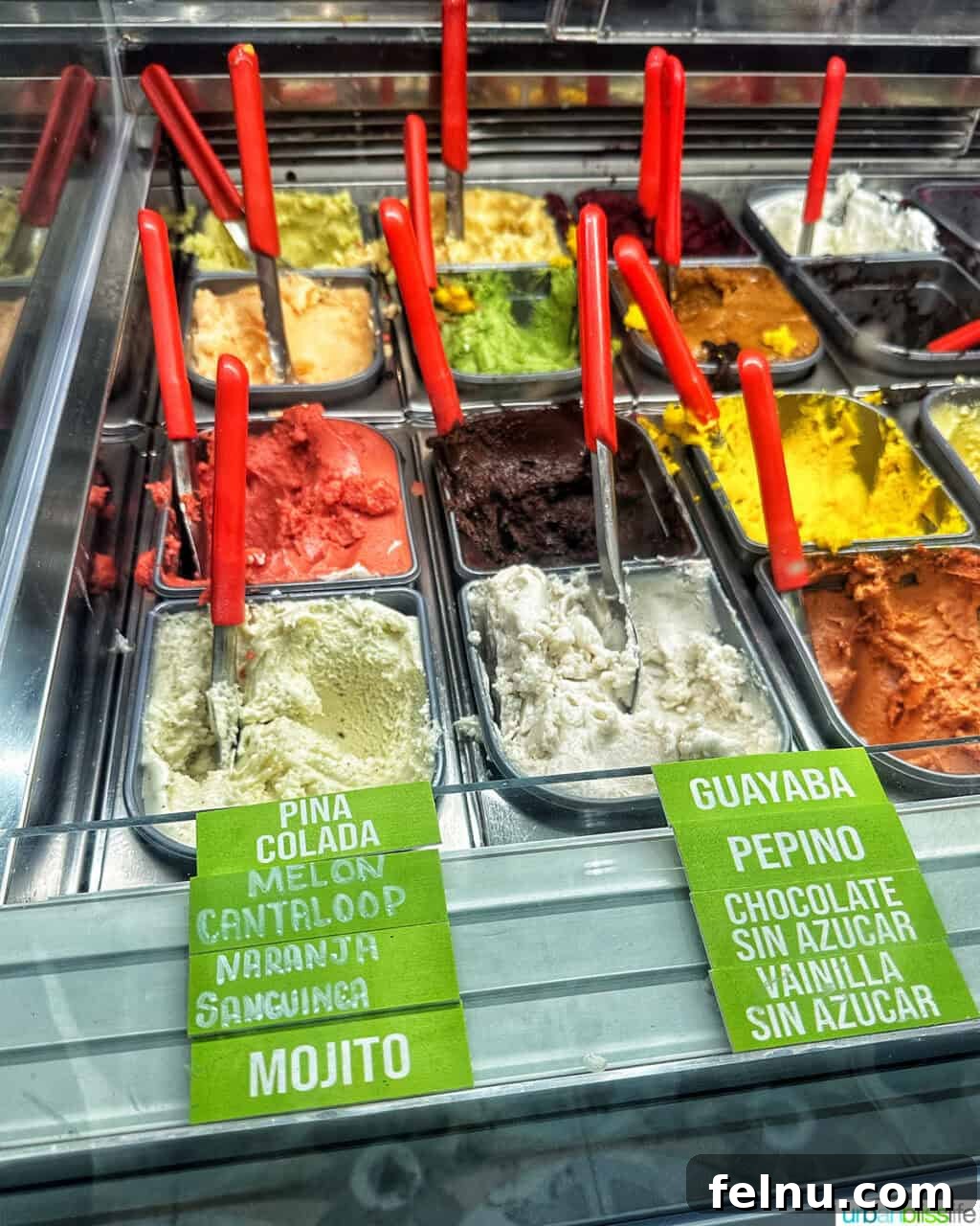 Bilbao Unveiled: Exploring Spain's Basque Masterpiece 33 A vibrant display of various gelato flavors in a glass case at Gelati Gelati.