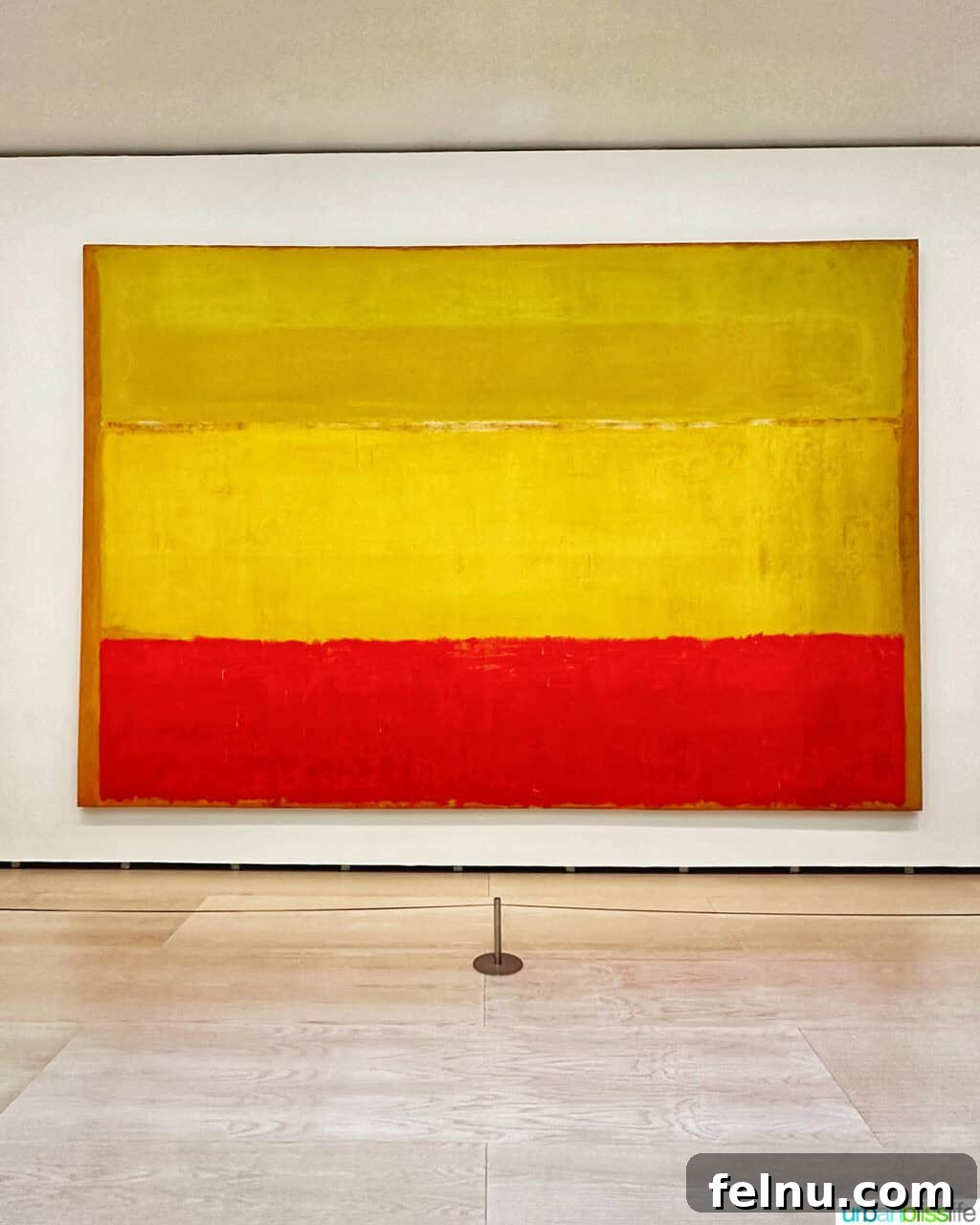 Bilbao Unveiled: Exploring Spain's Basque Masterpiece 10 A profound and color-field painting by Mark Rothko, exhibiting his characteristic large, soft-edged rectangles of color, in the Guggenheim Museum Bilbao.