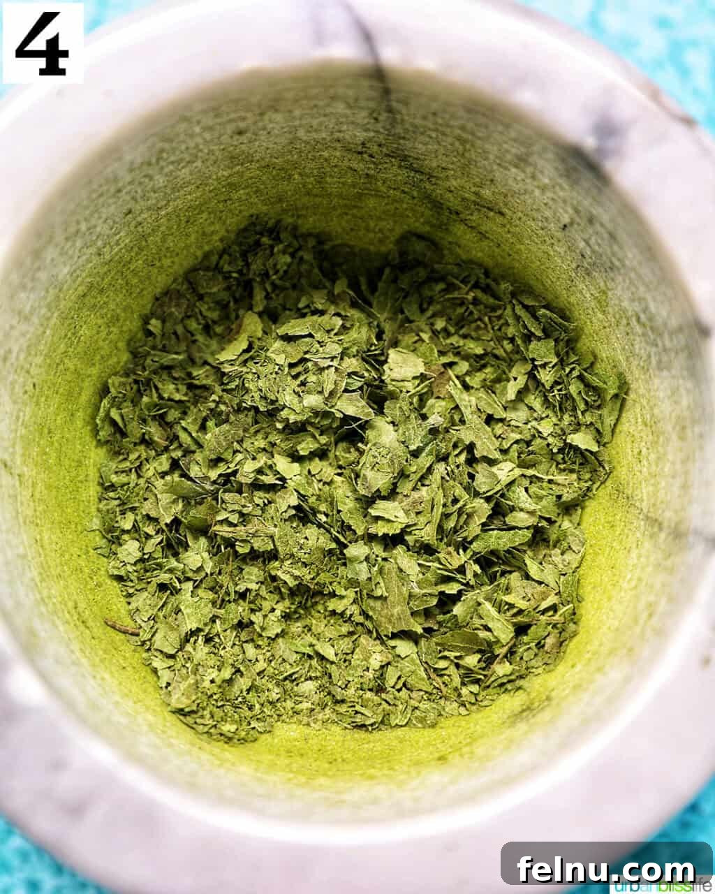 Crushed mint in a marble bowl