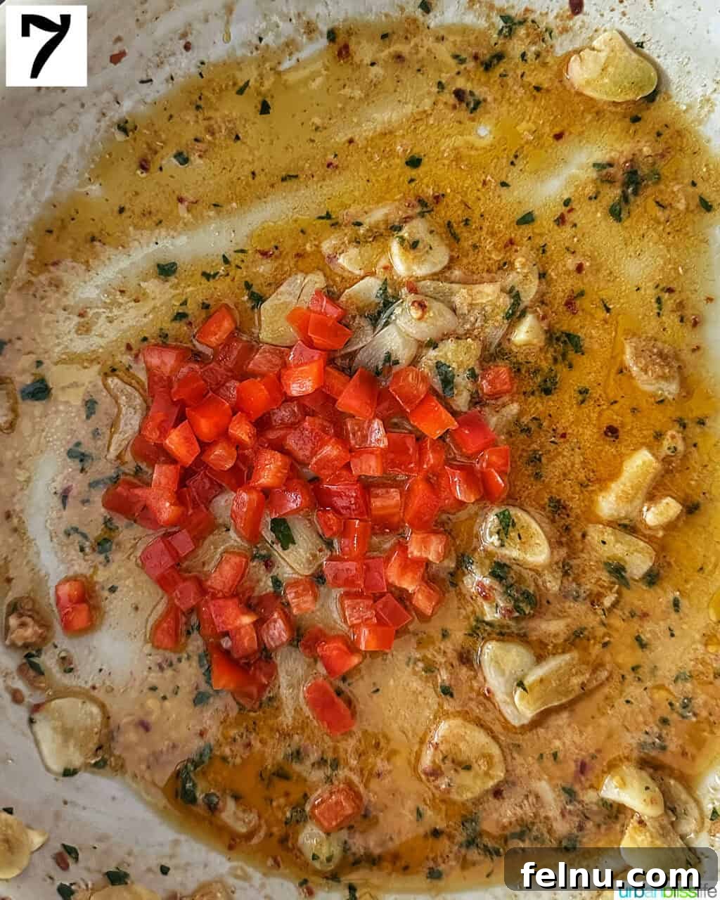 Savory Shrimp Bites 12 chopped red peppers and sliced garlic in olive oil.