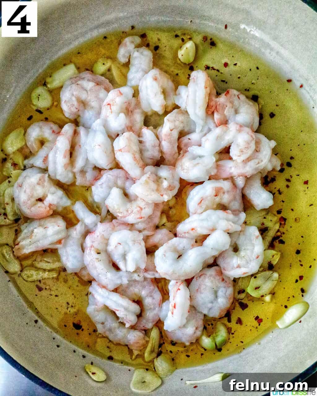 Savory Shrimp Bites 8 skillet of shrimp in garlic olive oil.