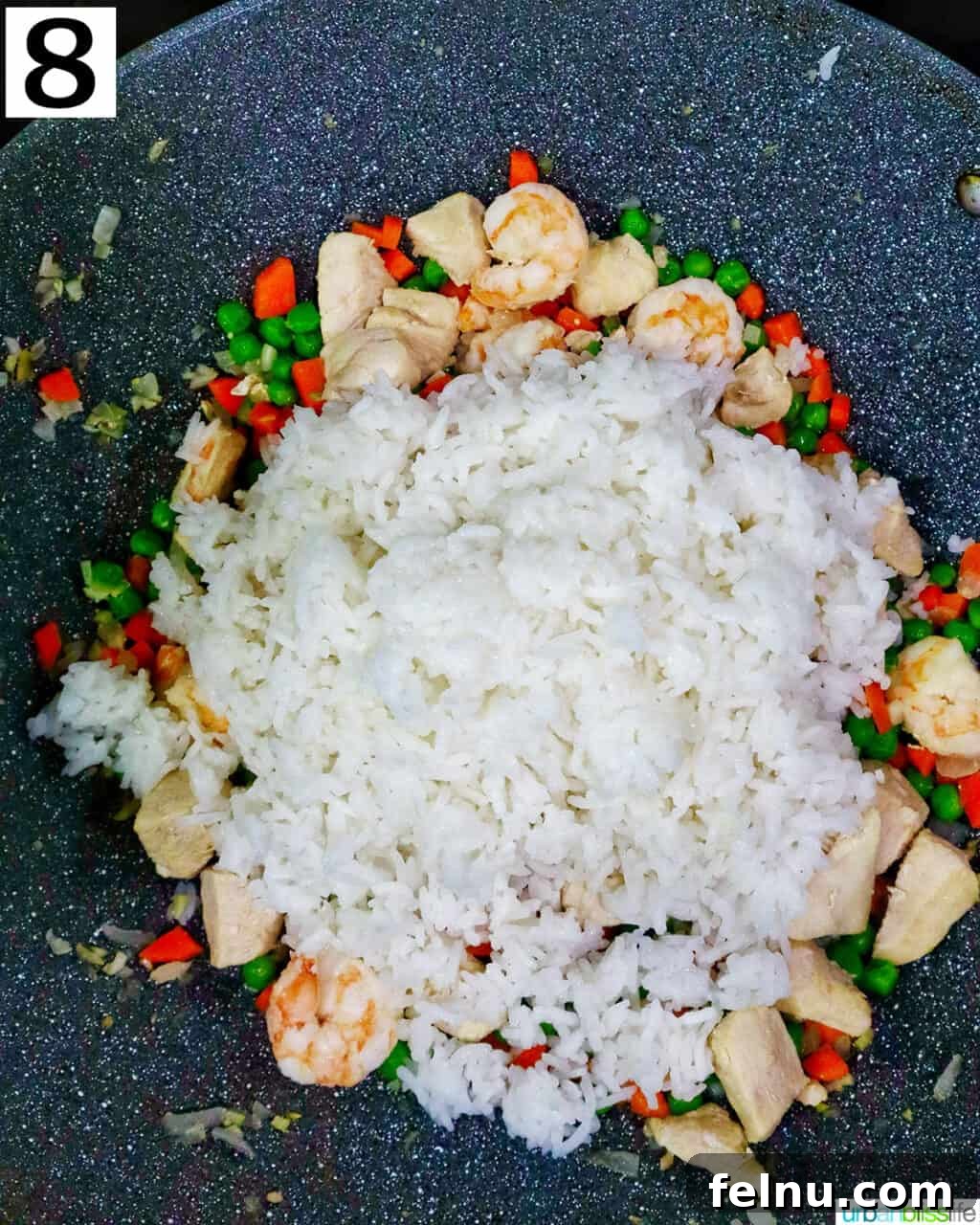 Shrimp and Chicken Stir-Fry Rice Bowl 13 Rice added to the wok