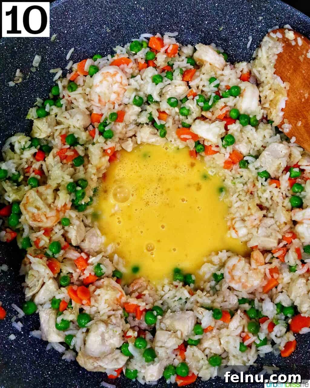 Shrimp and Chicken Stir-Fry Rice Bowl 15 Adding egg to the fried rice