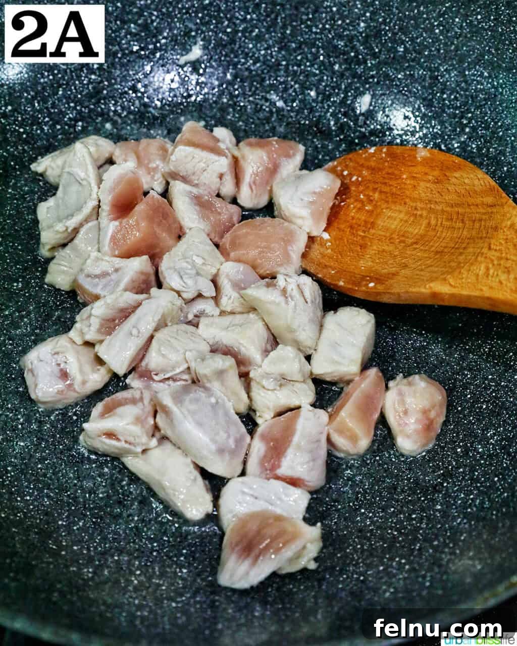 Shrimp and Chicken Stir-Fry Rice Bowl 6 Chicken pieces in a wok