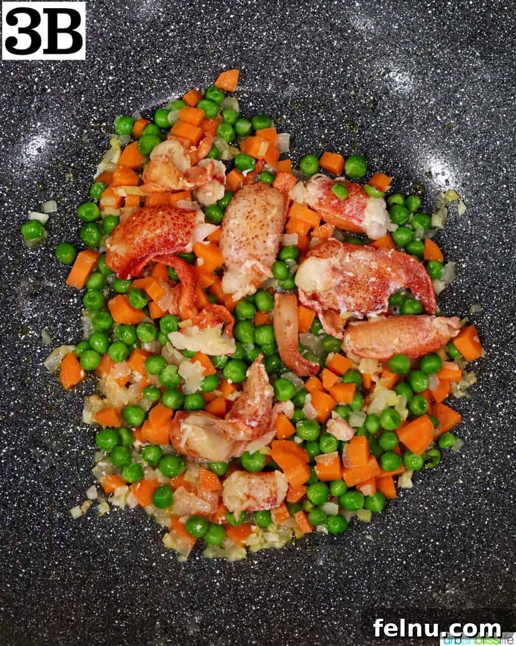 Decadent Lobster Fried Rice 9 lobster meat with vegetables cooking in a wok.