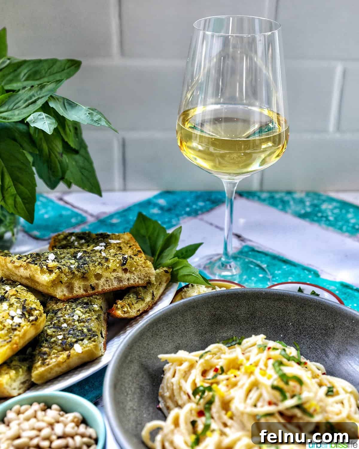 Crafting Your Own Tahini 17 Tahini Pasta with a glass of white wine.