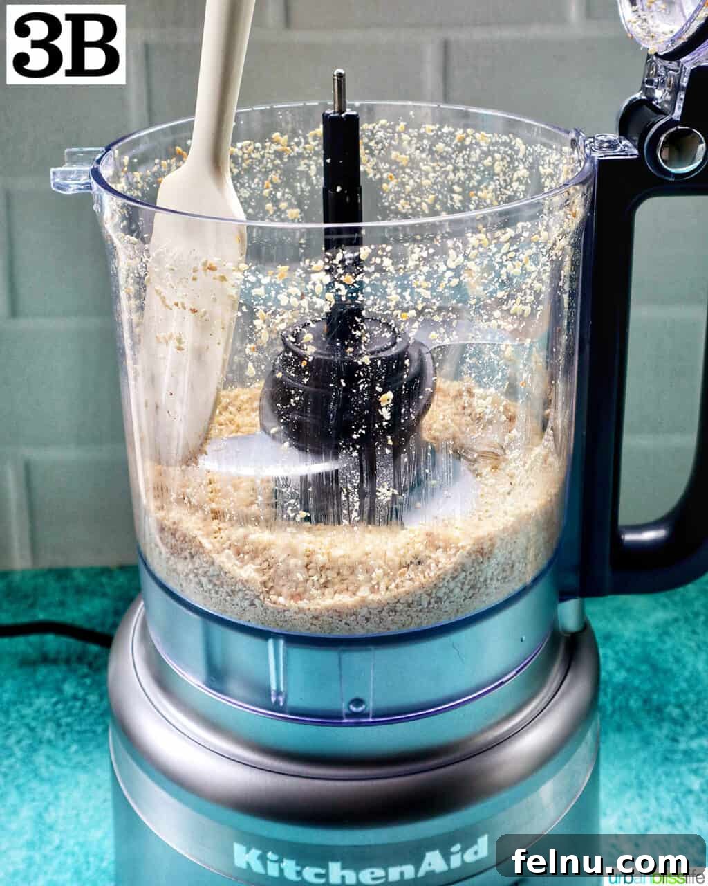 Crafting Your Own Tahini 9 food processor with sesame seeds.
