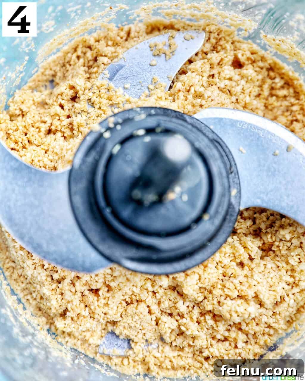 Crafting Your Own Tahini 10 food processor with sesame seeds pulsed to make tahini.