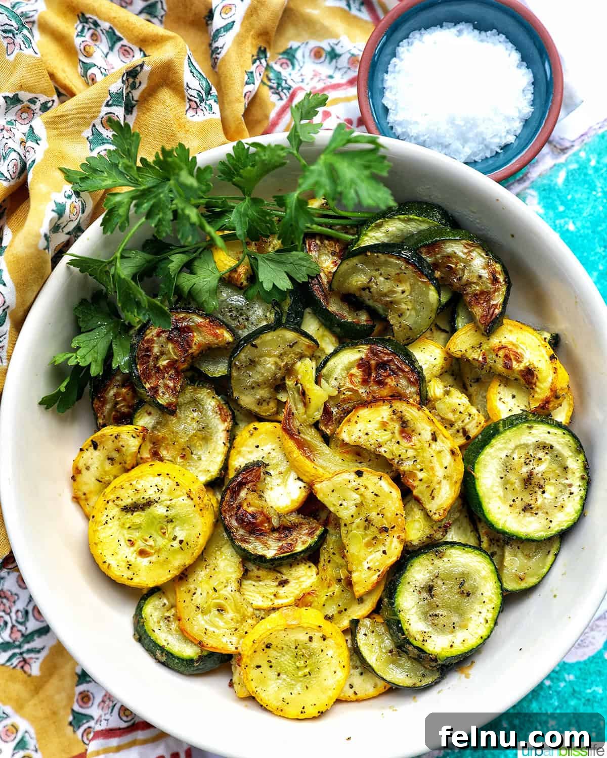 Air Fryer Zucchini and Squash Medley 2 Air Fryer Zucchini and Yellow Squash in a white bowl