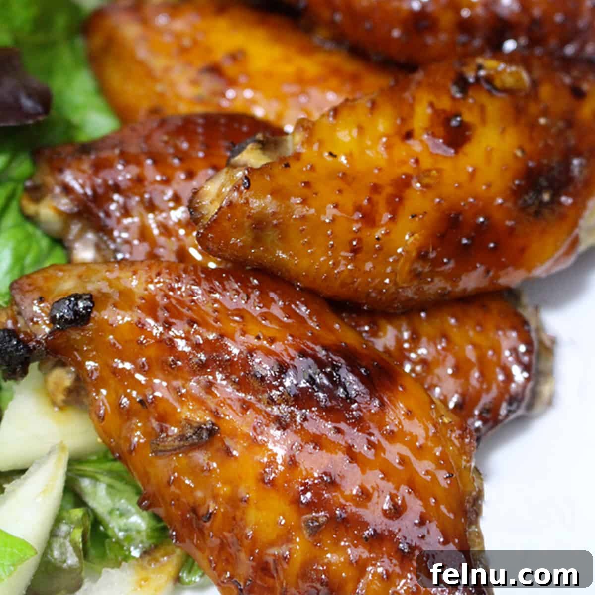 Sticky Honey Bourbon Wings, baked to perfection and full of flavor.