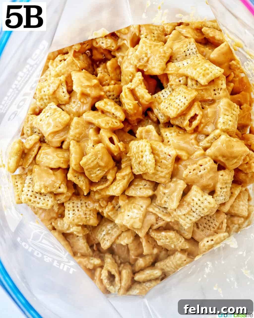 Effortlessly Delicious Patriotic Puppy Chow 11 Coated patriotic puppy chow cereal ready for powdered sugar in a large ziplock bag.