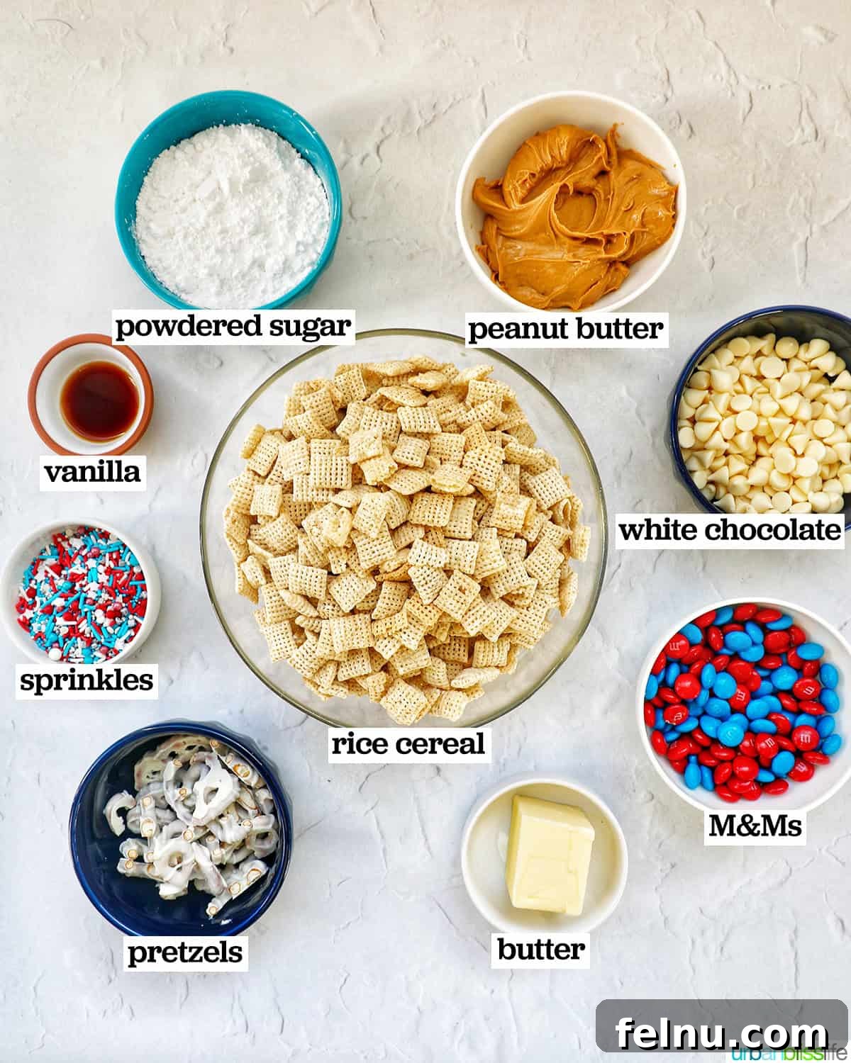 Effortlessly Delicious Patriotic Puppy Chow 4 Bowls of ingredients for patriotic puppy chow, including white chocolate chips, peanut butter, Chex cereal, M&Ms, and sprinkles.