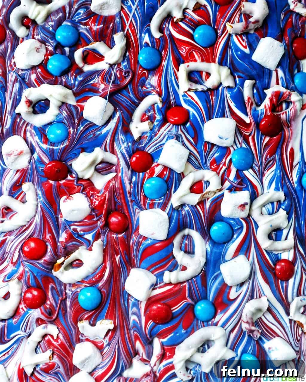 Fourth of July Freedom Bark 14 A beautiful close-up of the finished red, white, and blue bark, adorned with a variety of colorful toppings, showcasing its festive appeal.
