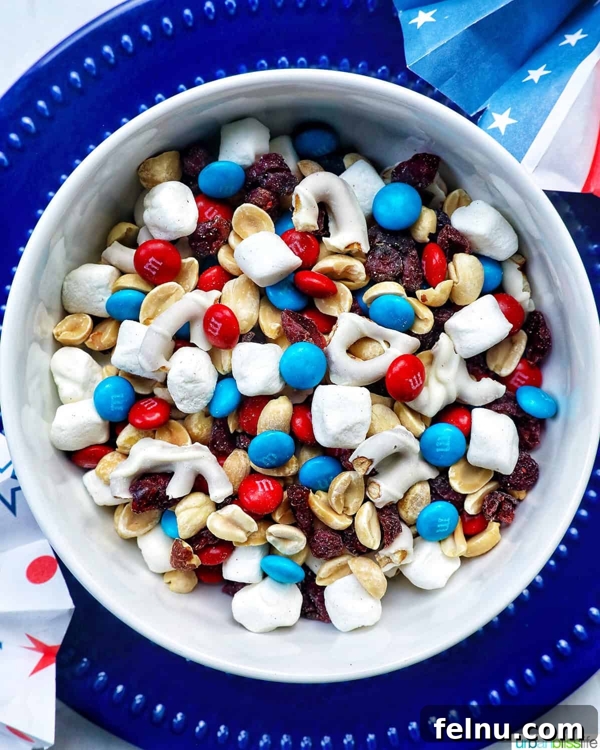 Stars and Stripes Snack Blend 2 A colorful bowl of red, white, and blue trail mix, perfect for patriotic celebrations.