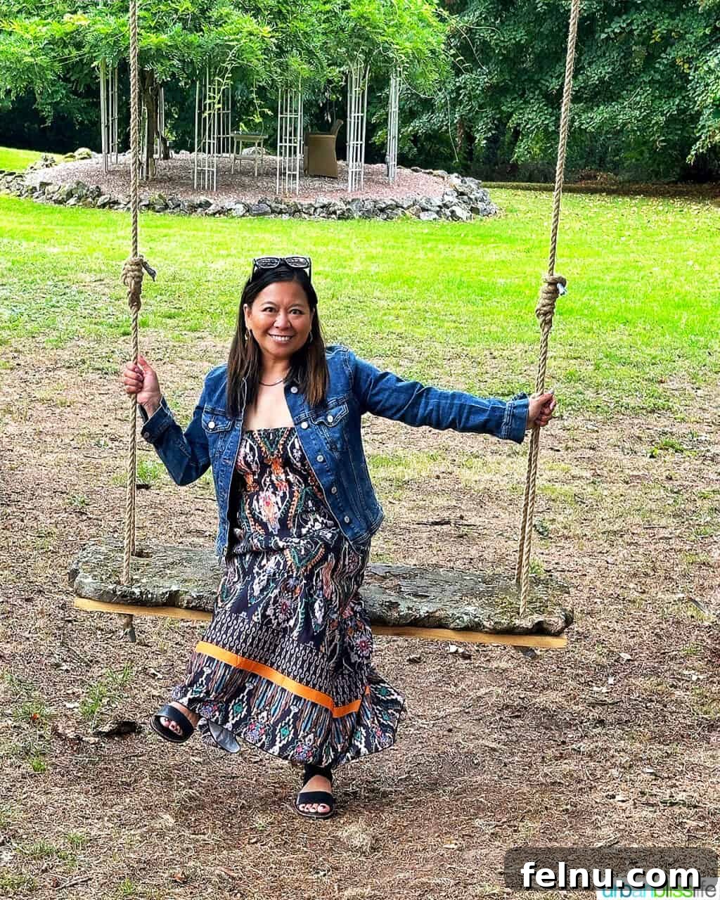 Woman on a swing at Chateau de Valcreuse in La Roche-Posay, France