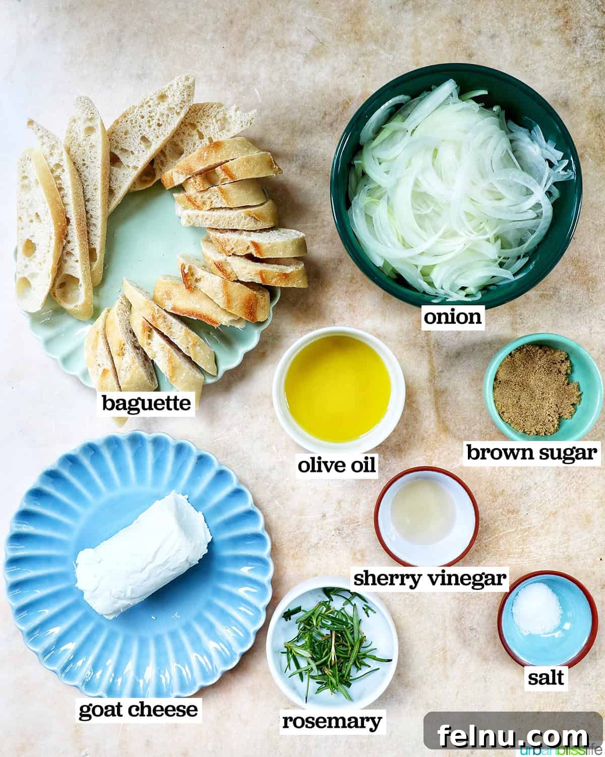 Golden Onion and Chevre Morsels 4 Bowls of ingredients including sliced onions, goat cheese, olive oil, and rosemary, prepared for making caramelized onion and goat cheese pintxos.