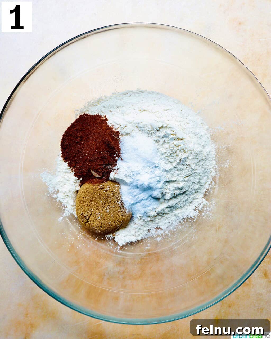 Dry ingredients (flour, sugar, spices) in a mixing bowl.