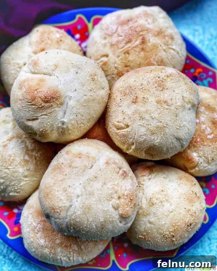 Soft Filipino Pandesal Rolls, ideal for a warm, comforting meal.