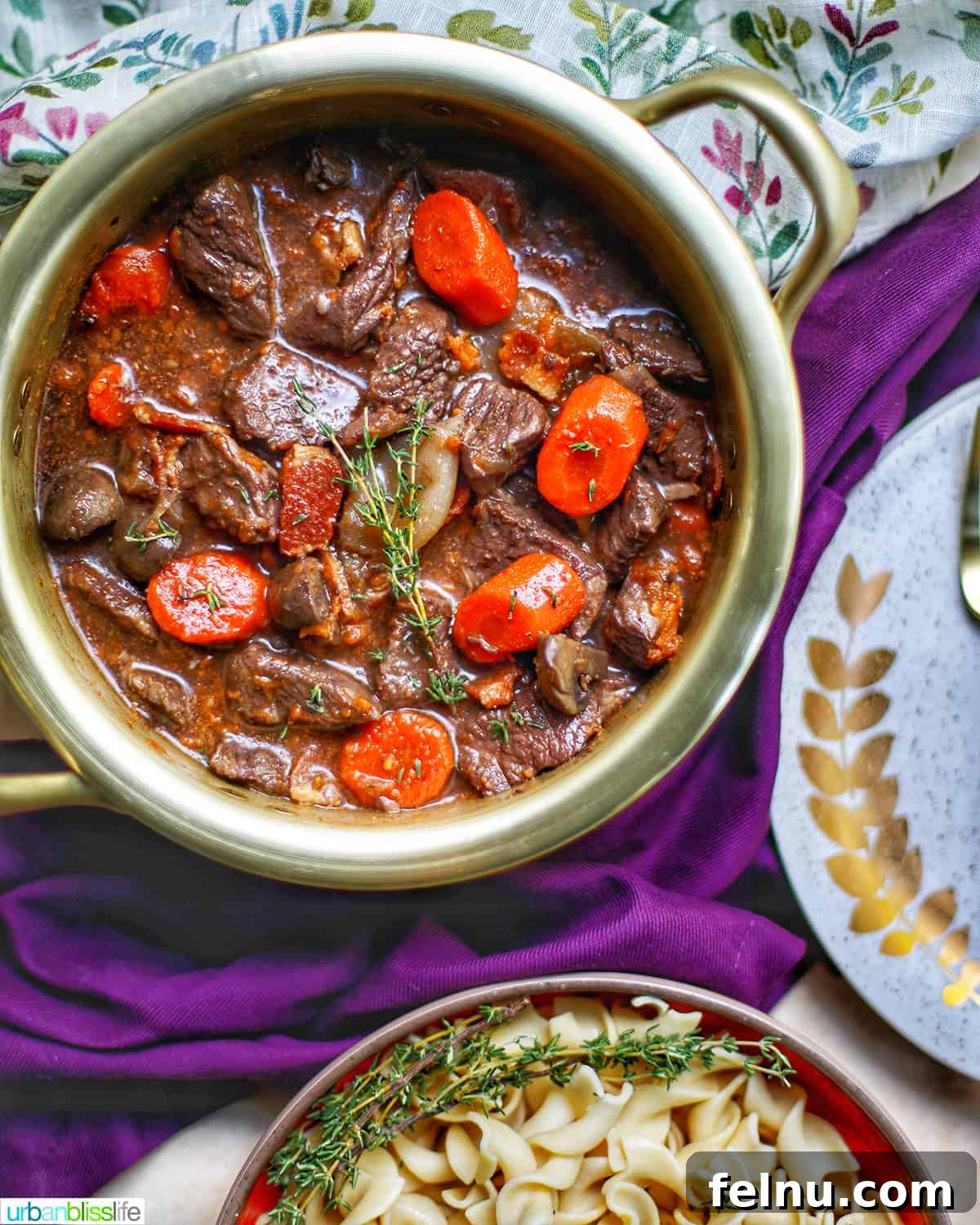 Pairing Perfection: Sides for Beef Stew 4 A serving of beef bourguignon with pasta peeking out, hinting at a delicious and complete meal experience.