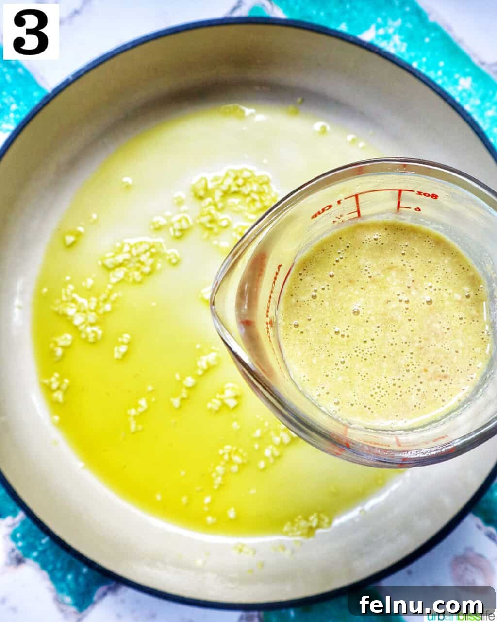 Tahini Sweet Treat 8 Adding liquid to garlic and olive oil in a saucepan.