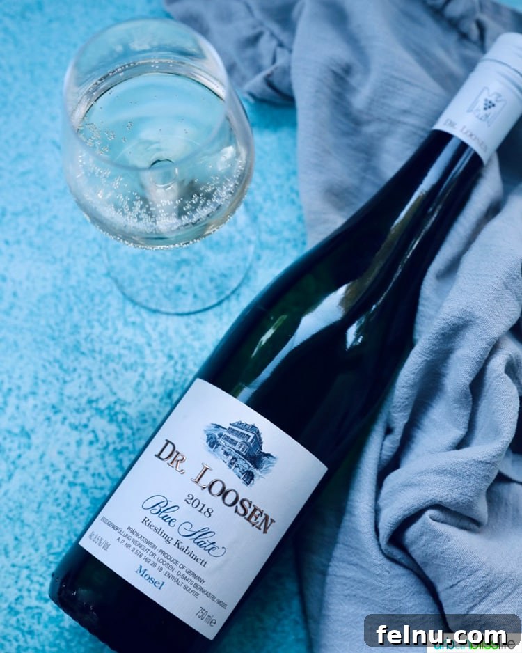 Dr Loosen Riesling Kabinett wine bottle and glass
