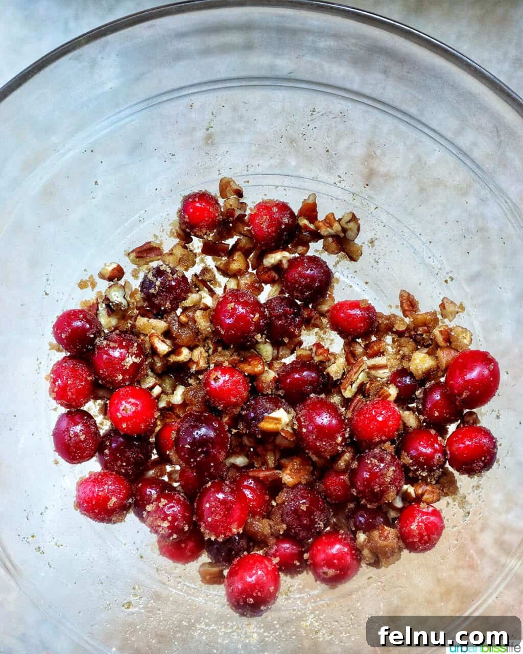 Cranberry and Pecan Crusted Brie 7 Cranberry, brown sugar, and pecan mixture in a bowl.