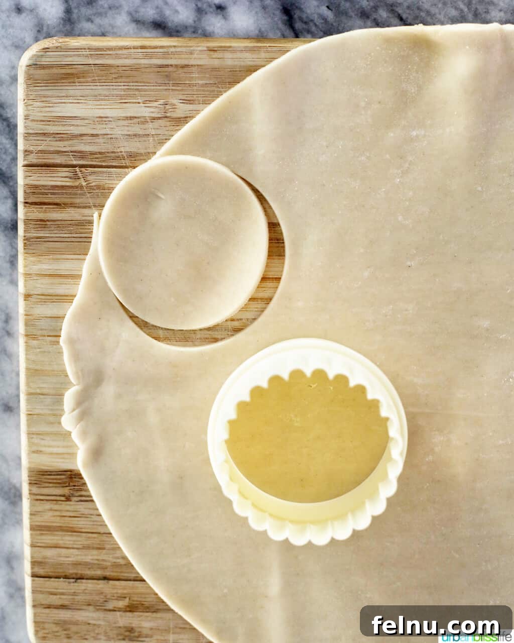 Mini Pecan Tarts 7 Cookie cutter cutting out circles for mini pecan pies
