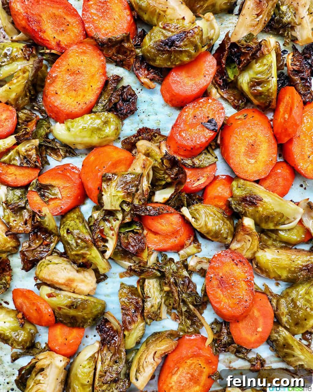 Roasted Brussels Sprouts with Maple-Glazed Carrots 8 Perfectly roasted Brussels sprouts and carrot slices fresh out of the oven.