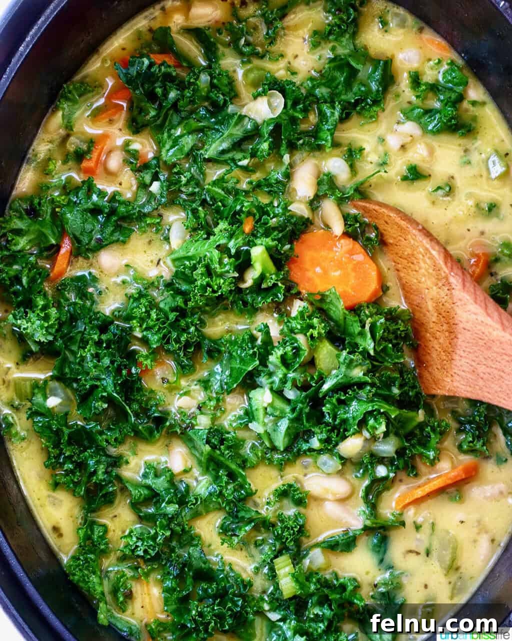 Tuscan Kale and White Bean Soup: A Hearty Italian Classic 19 Finished Tuscan kale and white bean soup in a Dutch oven
