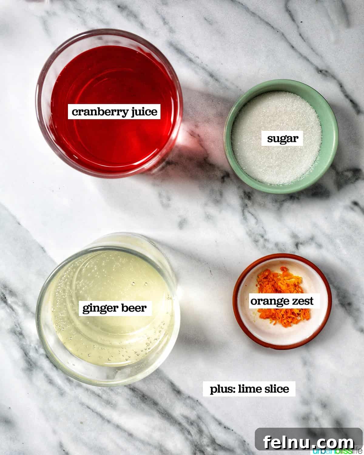 bowls of ingredients to make cranberry mocktails.