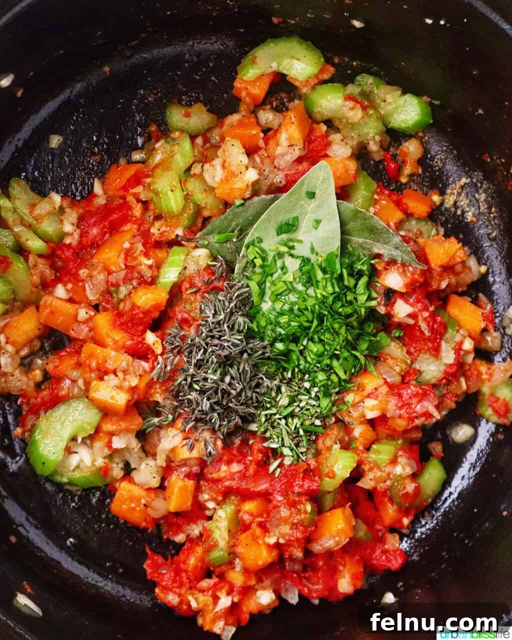 herbs added to mirepoix of carrots, celery, and onions in a Dutch oven.
