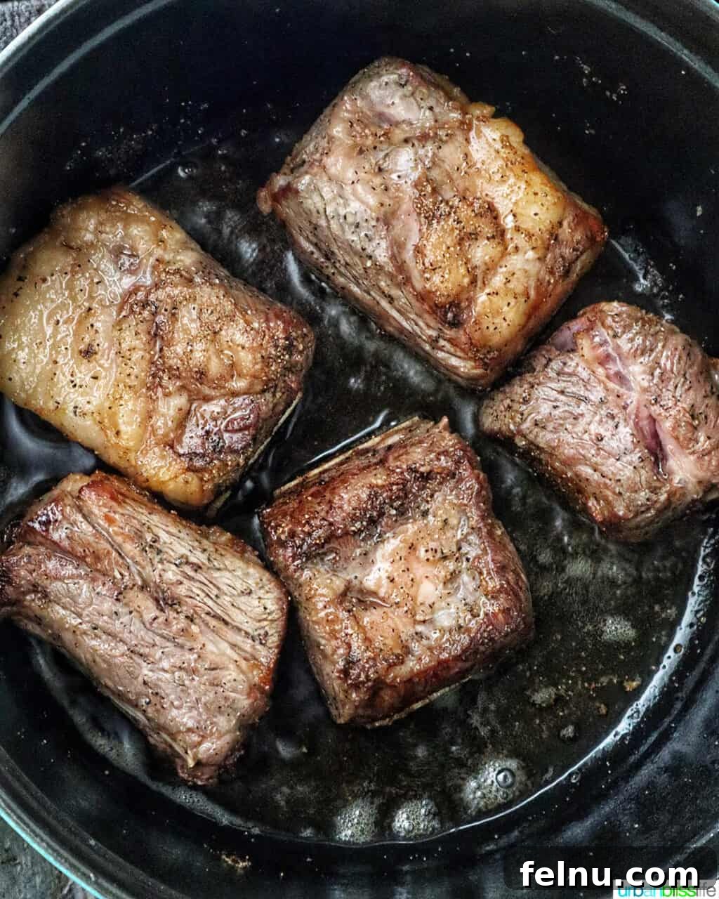 beef short ribs in a Dutch oven.