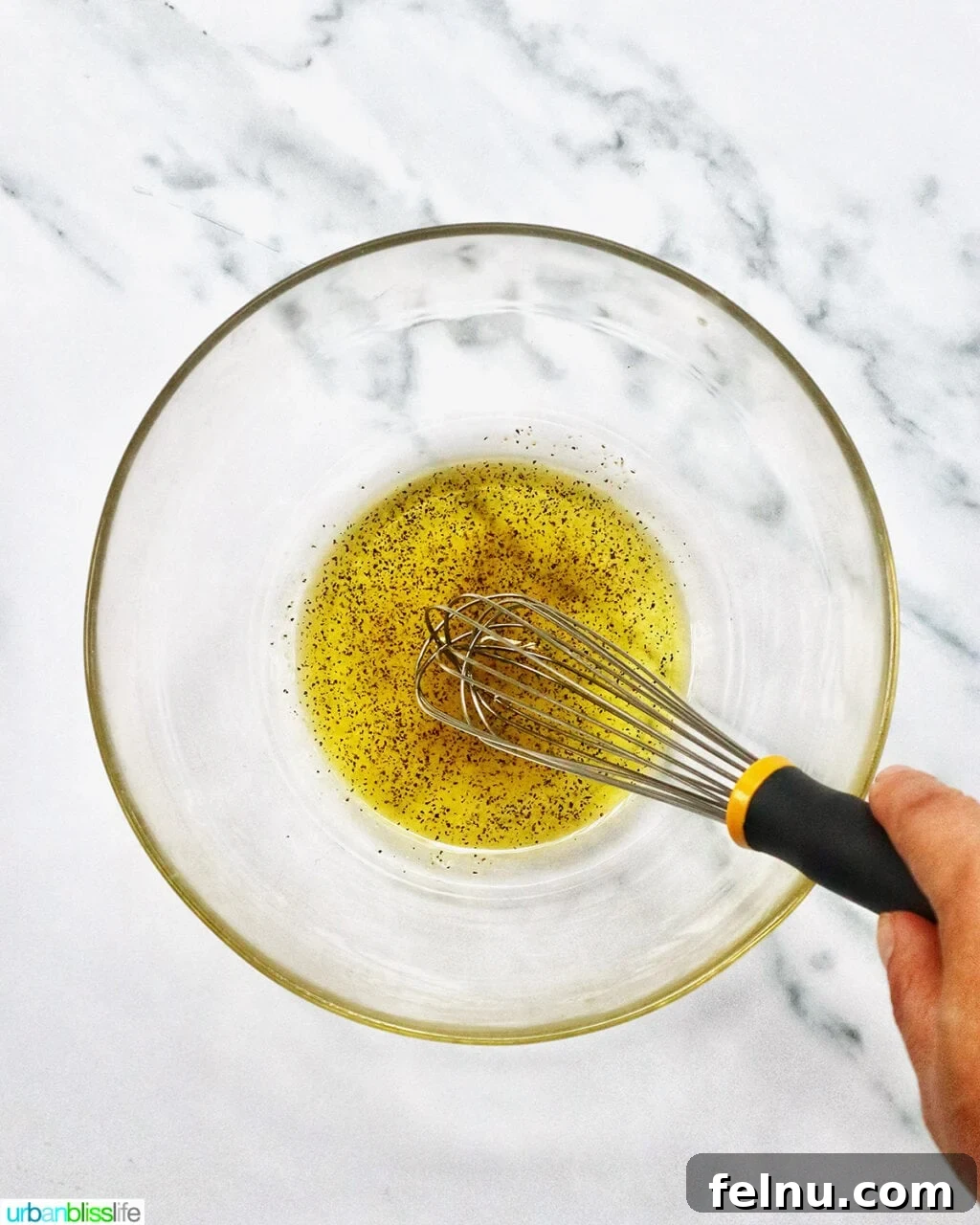 Antipasto Holiday Wreath 5 Whisking olive oil and vinegar