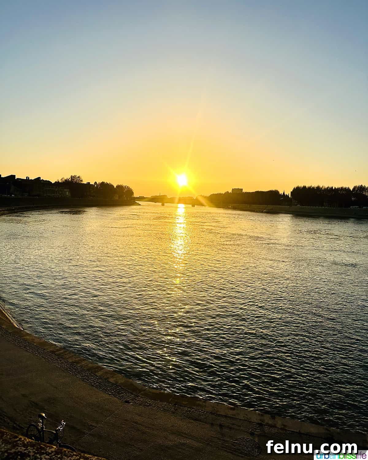 Things to Do and See in Arles 13 Rhone River at Sunset in Arles, France