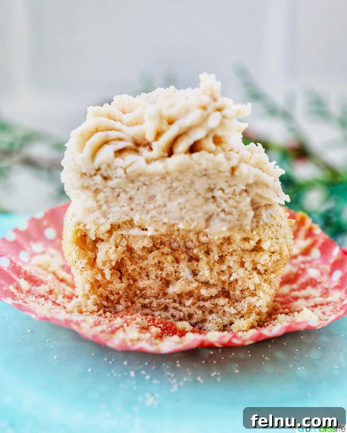 Cinnamon Swirl Delights 20 Cinnamon cupcake sliced in half with center exposed.