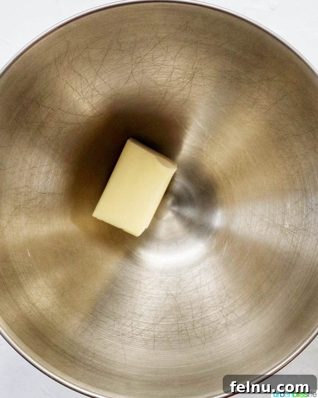 Cinnamon Swirl Delights 7 Butter in a stand mixer bowl.